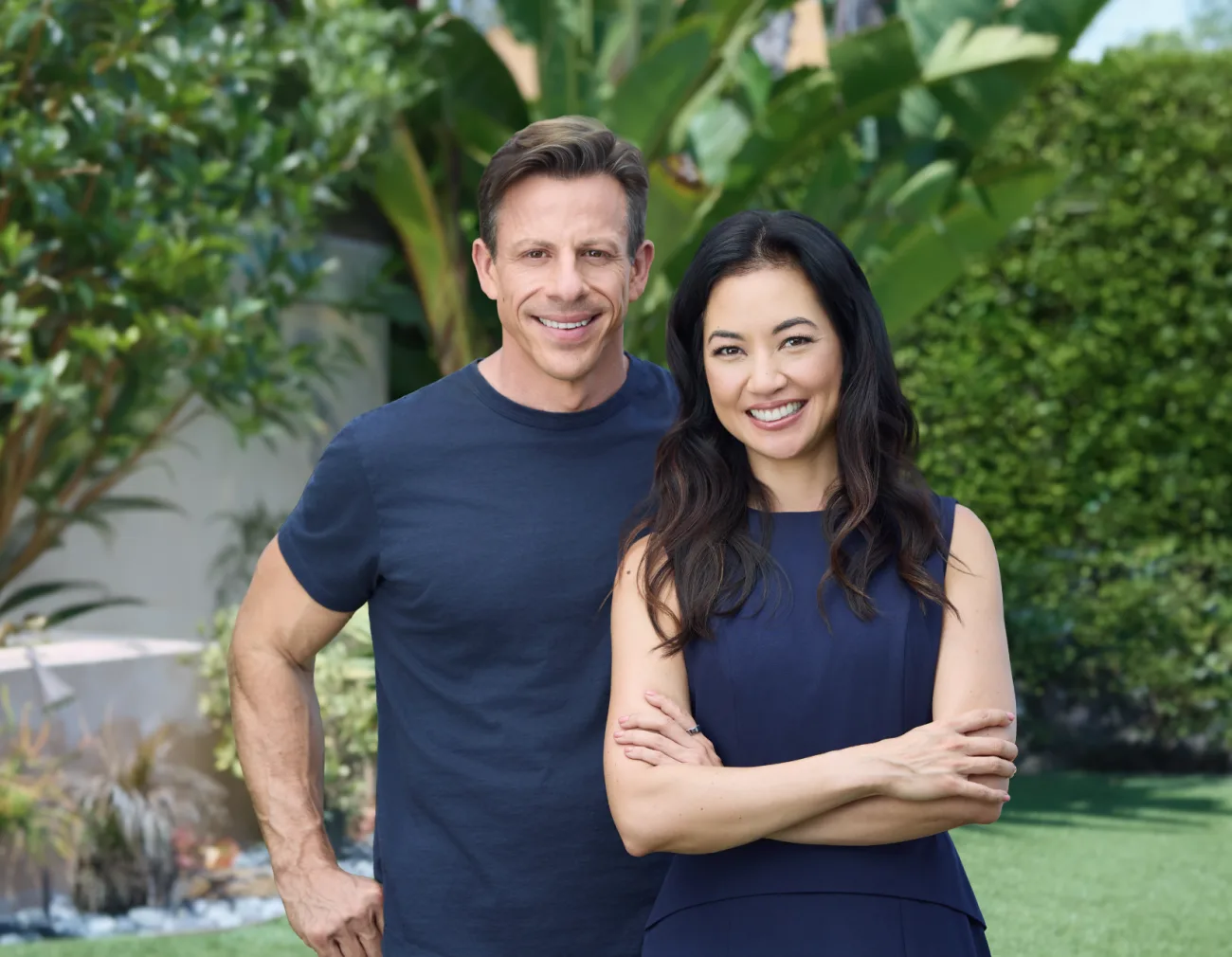 Matt Mazzeo and Tina Wu standing together in a garden