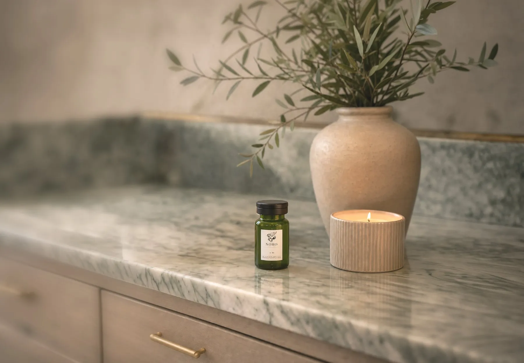 NOHO glutathione vial on a marble vanity