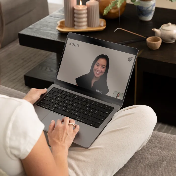 Member on a video consultation with a NOHO clinician
